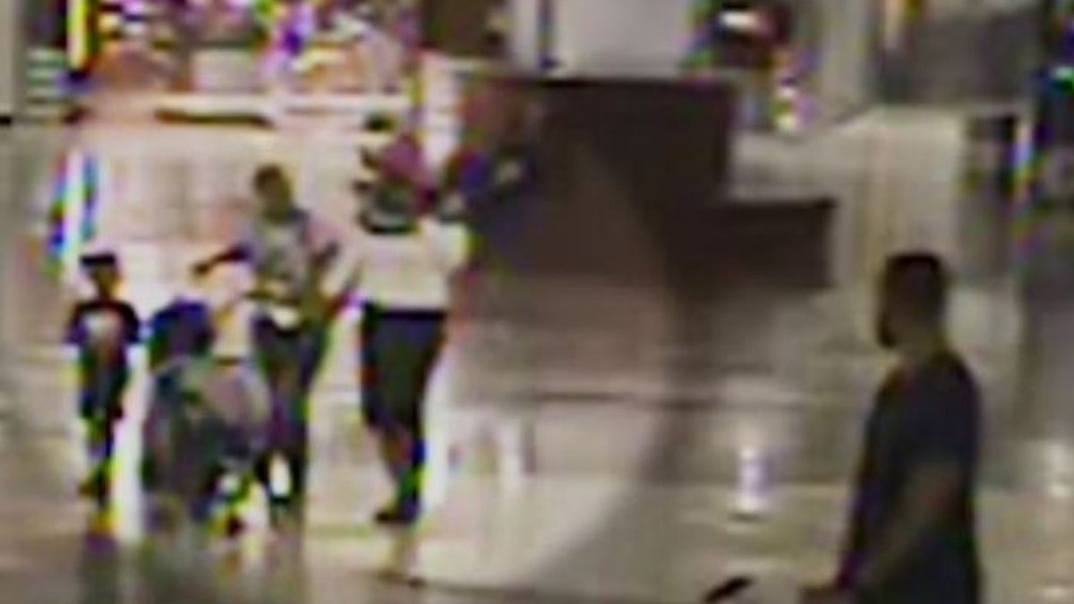 A woman, pictured, allegedly attempted to kidnap two young children who were traveling with their family through Hartsfield-Jackson Atlanta International Airport on Monday.