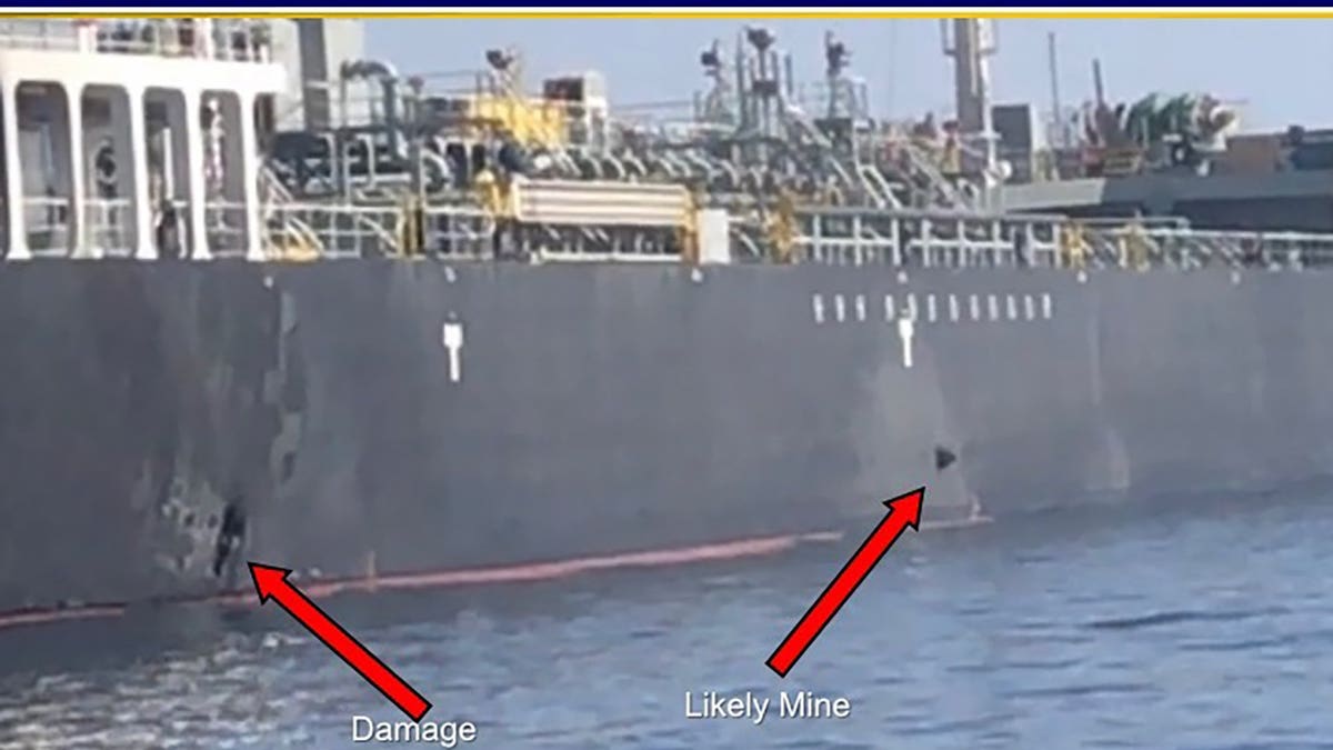 This June 13, 2019, image released by the U.S. military's Central Command, shows damage and a suspected mine on the Kokuka Courageous in the Gulf of Oman near the coast of Iran. The U.S. military on Friday, June 14, 2019, released a video it said showed Iran's Revolutionary Guard removing an unexploded limpet mine from one of the oil tankers targeted near the Strait of Hormuz, suggesting the Islamic Republic sought to remove evidence of its involvement from the scene.