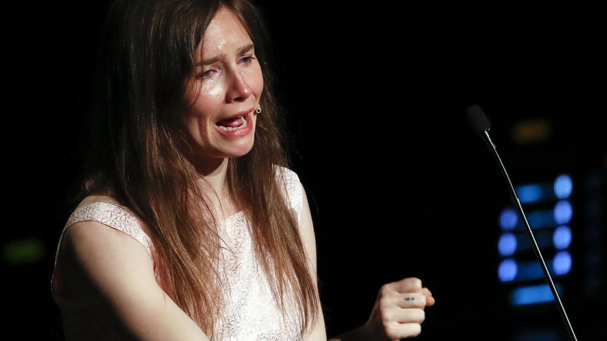 Amanda Knox gets emotional as she speaks at a Criminal Justice Festival at the University of Modena, Italy, Saturday, June 15, 2019. Knox, a former American exchange student who became the focus of a sensational murder case, arrived in Italy Thursday for the first time since an appeals court acquitted her in 2011 in the slaying of her British roommate.