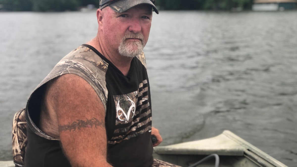 Bart Moore, a retired Pine Bluff firefighter, built his house 30 years ago with his late wife. The house is now underwater.