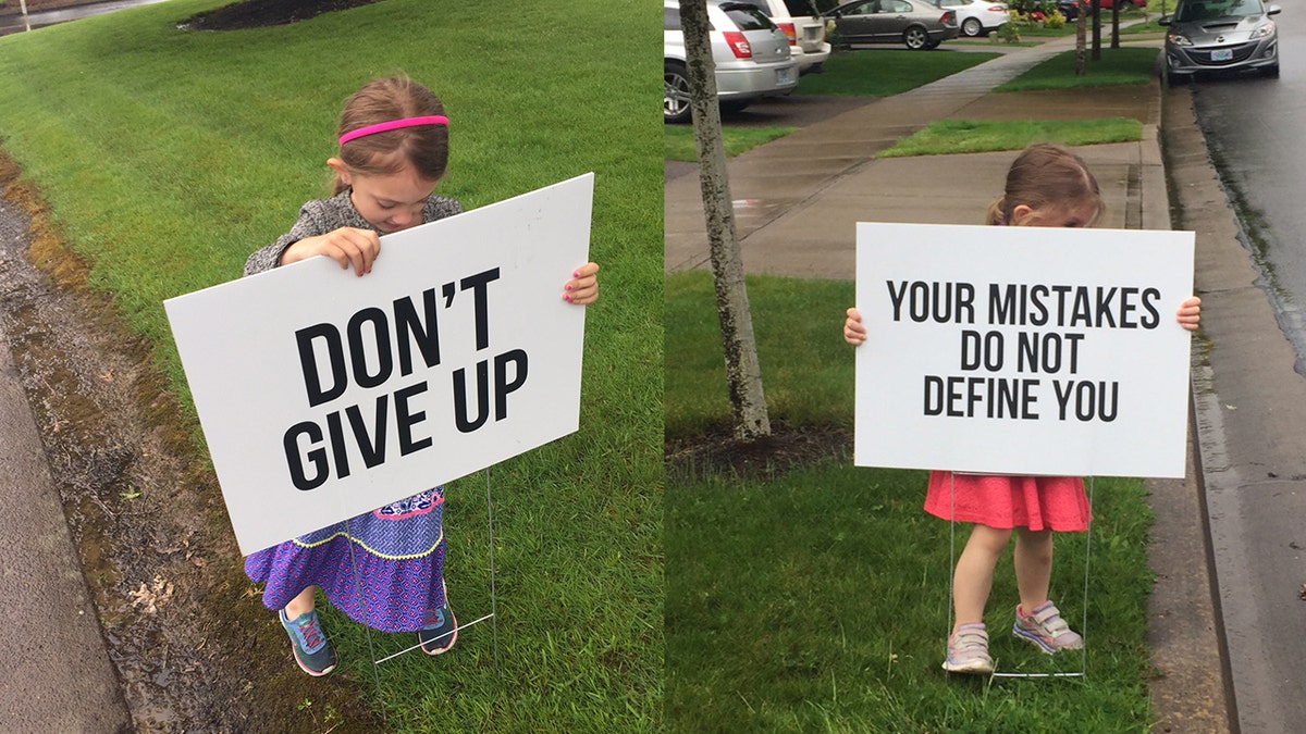 The founder's young daughters, pictured, have helped set up the famous signs. 