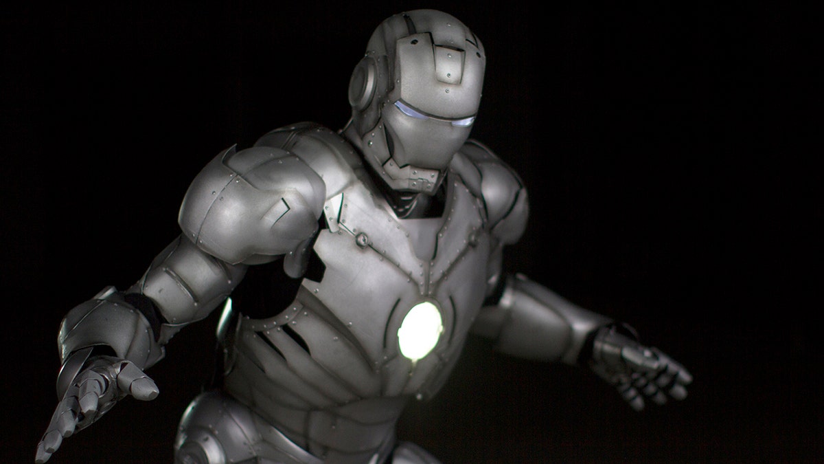 Beauty shots of Adam Savage's 3D printed Iron Man suit, with his helmet. (Credit: Discovery Channel)