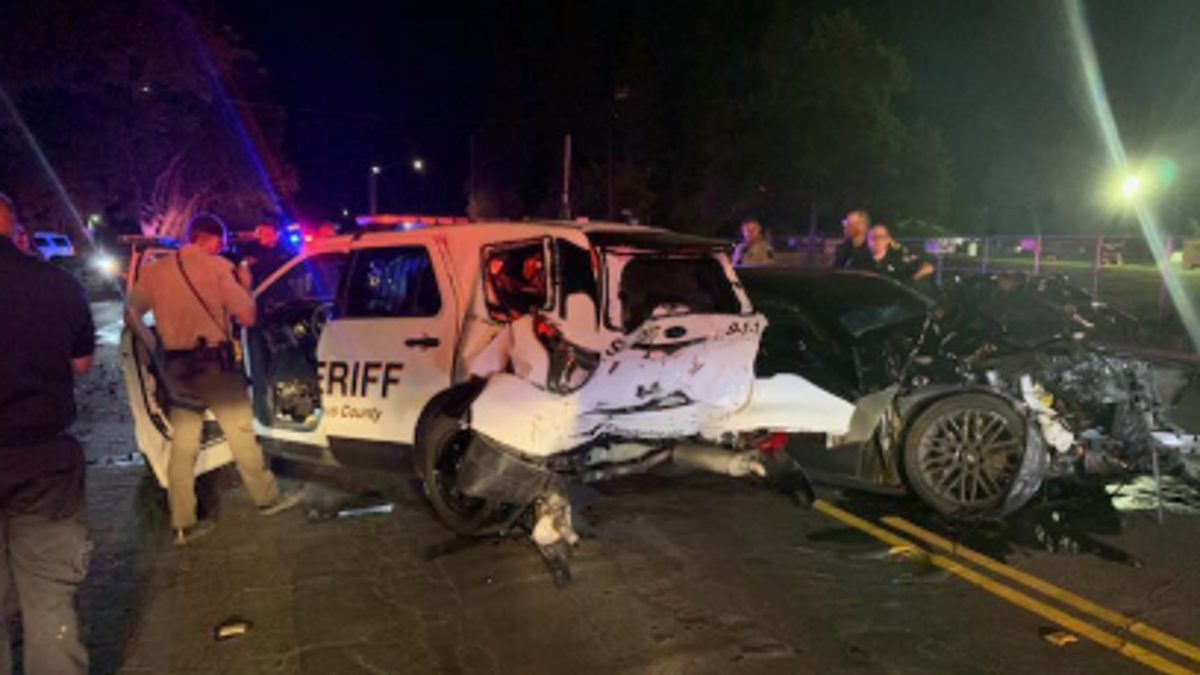 A suspected drunk driver rear-ended a patrol car early Saturday with two deputies inside.