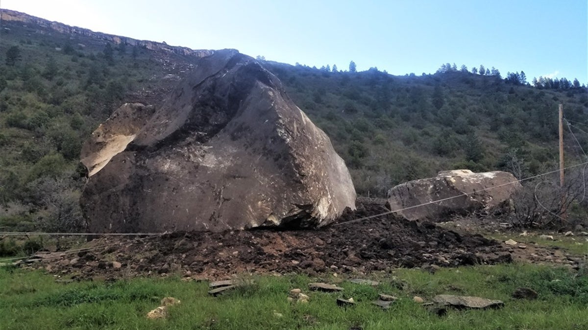 The massive boulder weighs an estimated 8.5 million pounds will stay put on Colorado Highway 145, officials said.