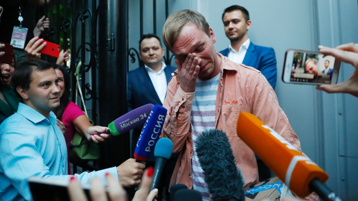 Prominent Russian investigative journalist Ivan Golunov, cries as he leaves a Investigative Committee building in Moscow, Russia, Tuesday, June 11, 2019. In a surprising turnaround, Russia's police chief on Tuesday dropped all charges against a prominent investigative reporter whose detention sparked public outrage and promised to go after the police officers who tried to frame the journalist as a drug-dealer.