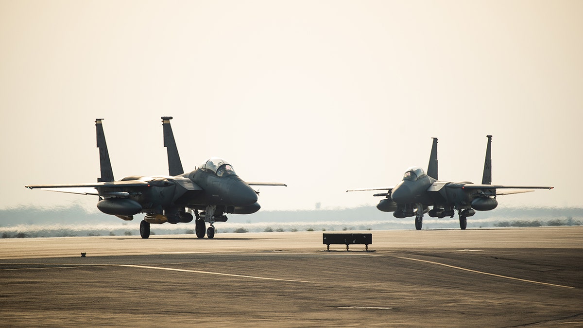 Two F-15E Strike Eagles from the 336th Fighter Squadron, 4th Fighter Wing at Seymour Johnson Air Force Base, North Carolina taxi the runway at Al Dhafra Air Base, United Arab Emirates, June 13, 2019. The F-15E’s joined ADABs inventory of other fighters to include F-15C Eagles and F-35A Lightning IIs.