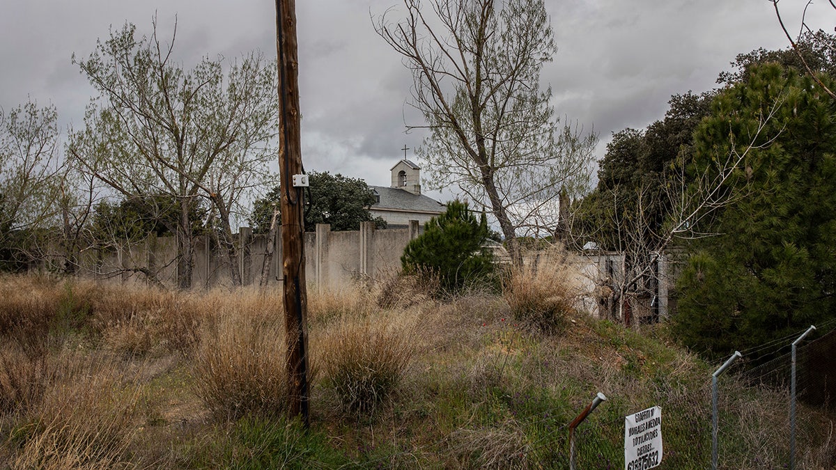In this Friday, April 5, 2019 photo, Franco's family tomb is seen in the background in Mingorrubio's cemetery. (AP Photo/Bernat Armangue)