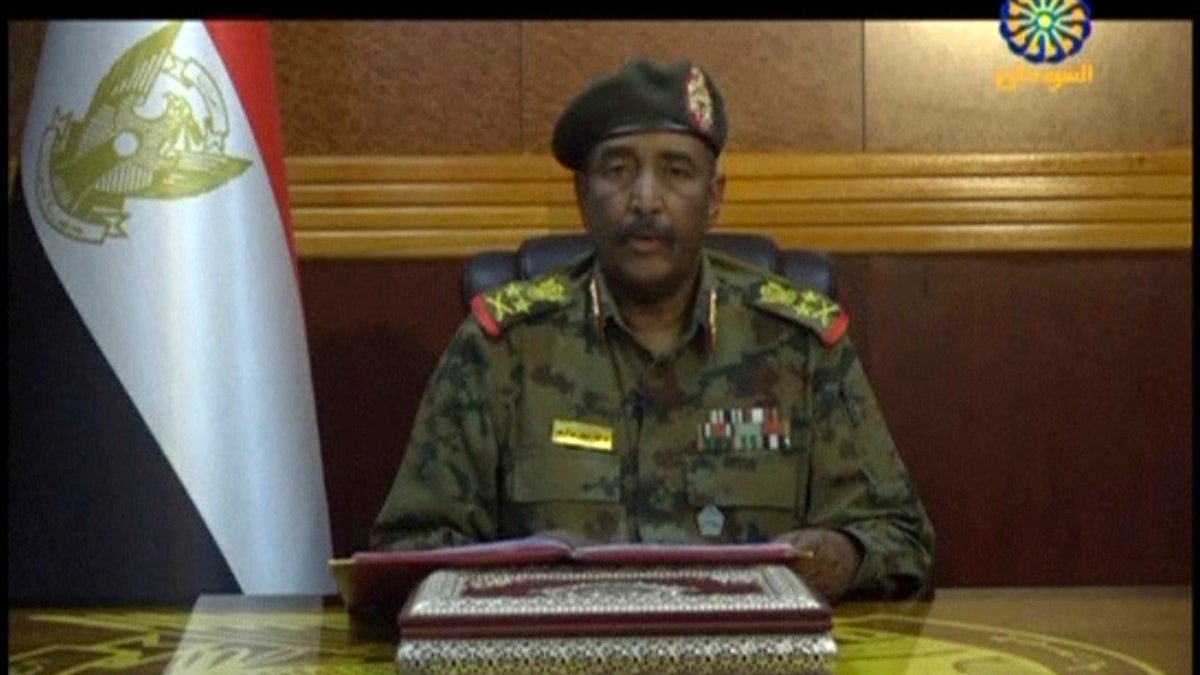 In this frame grab from video provided by Sudan TV, Lieutenant General Abdel-Fattah Burhan, head of the Sudanese Transitional Military Council, TMC, makes a broadcast announcement in Khartoum, Sudan, Tuesday, June 4, 2029. (Sudan TV via AP)