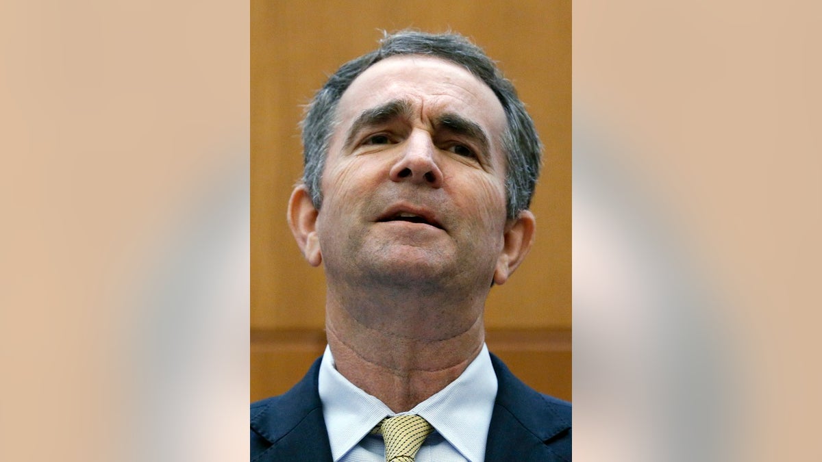 Virginia Governor Ralph Northam makes remarks at a press conference dealing with gun violence in the state, inside the Patrick Henry Building in Richmond, Va., Tuesday, June 4, 2019. (Bob Brown/Richmond Times-Dispatch via AP)