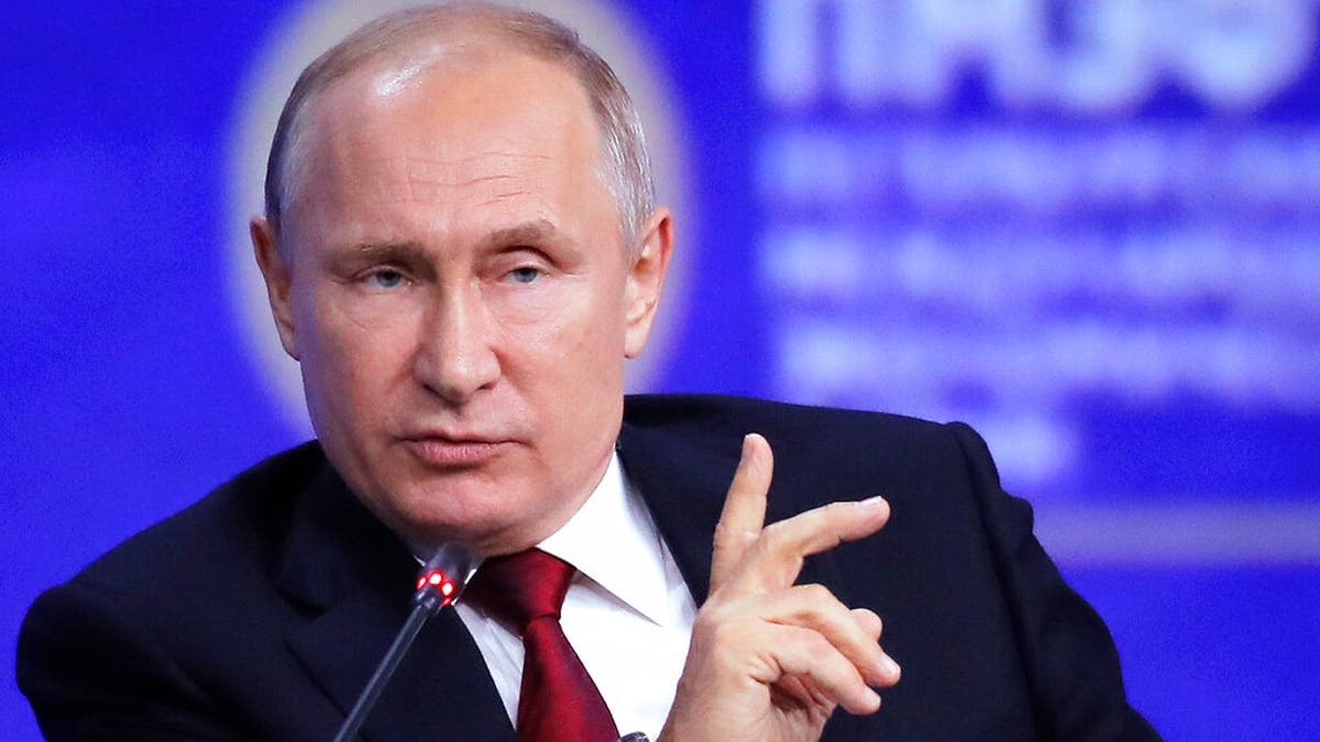 FILE: Russian President Vladimir Putin gestures while speaking at the St. Petersburg International Economic Forum in St. Petersburg, Russia.