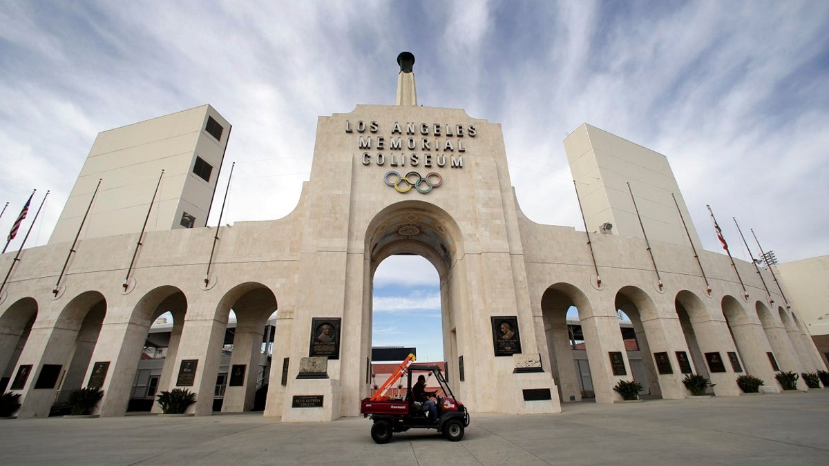 This Jan. 13, 2016 file photo shows the peristyle of the Los Angeles Memorial Coliseum in Los Angeles. United Airlines and the University of Southern California have reached a new naming rights agreement for Los Angeles Memorial Coliseum to resolve criticism that putting a corporate name on the stadium disrespects its role as a World War I monument. (AP Photo/Nick Ut, File)