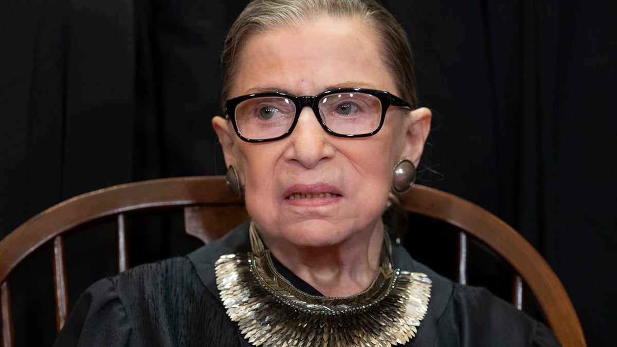 Ruth Bader Ginsburg posing for photo