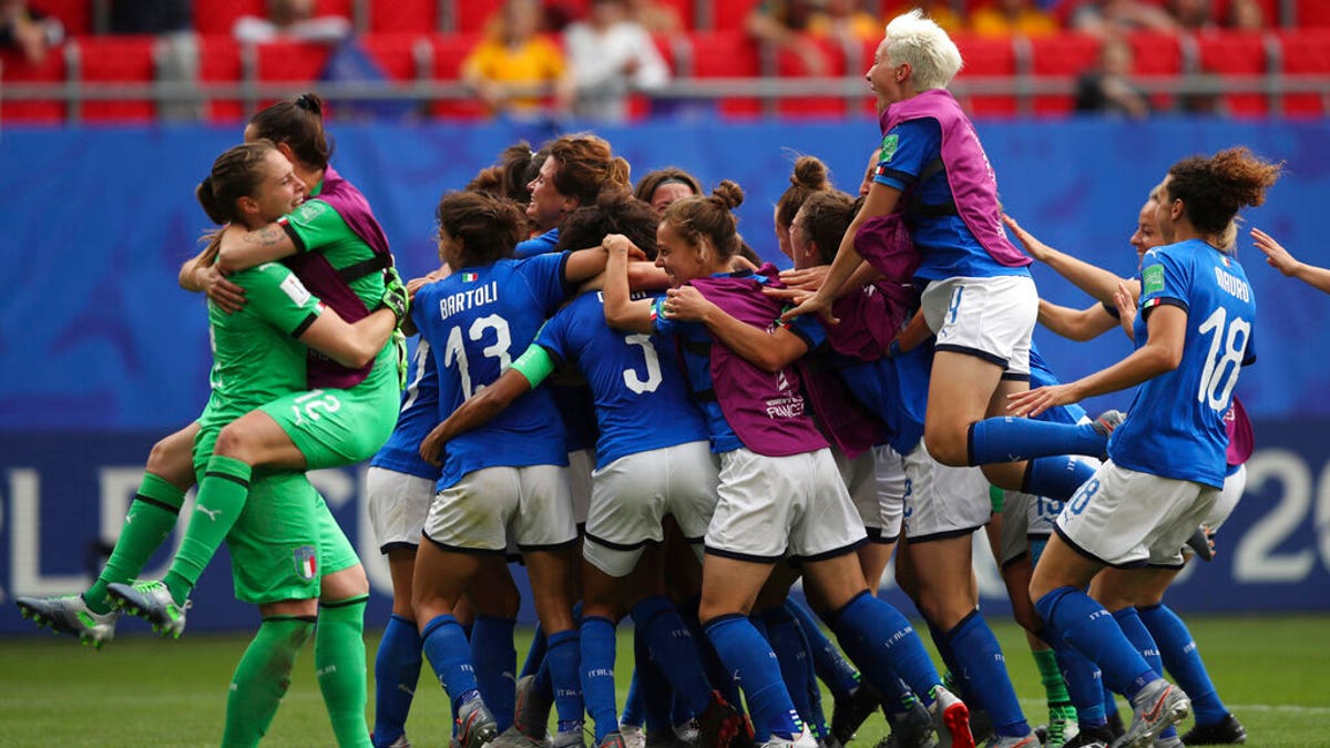 Players of Italy celebrate after winning the Women's World Cup Group C soccer match between Australia and Italy at the Stade du Hainaut in Valenciennes, Sunday, June 9, 2019.
