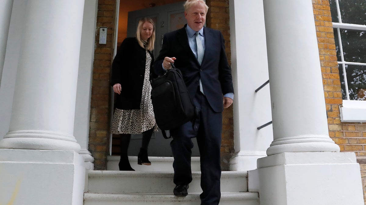 British Conservative Party lawmaker Boris Johnson leaves his home in London, Thursday, June 13, 2019. (AP Photo/Frank Augstein)