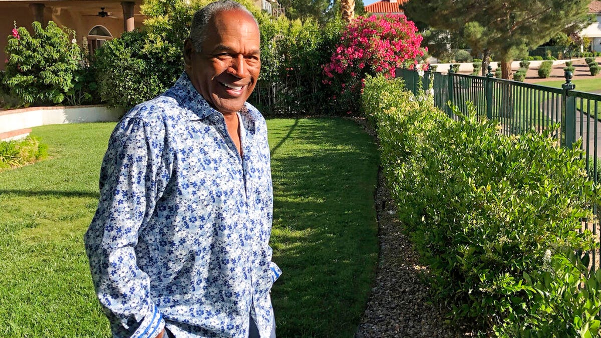 FILE: O.J. Simpson in the garden of his Las Vegas area home.