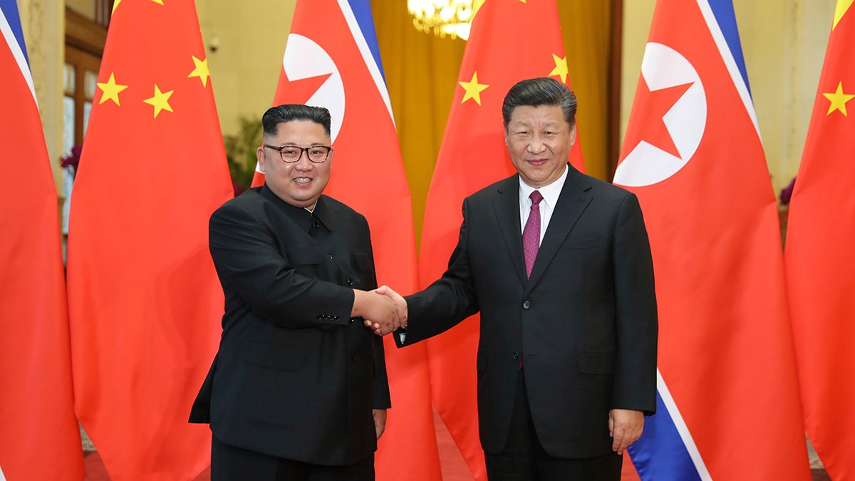 Kim Jong Un and Xi Jinping