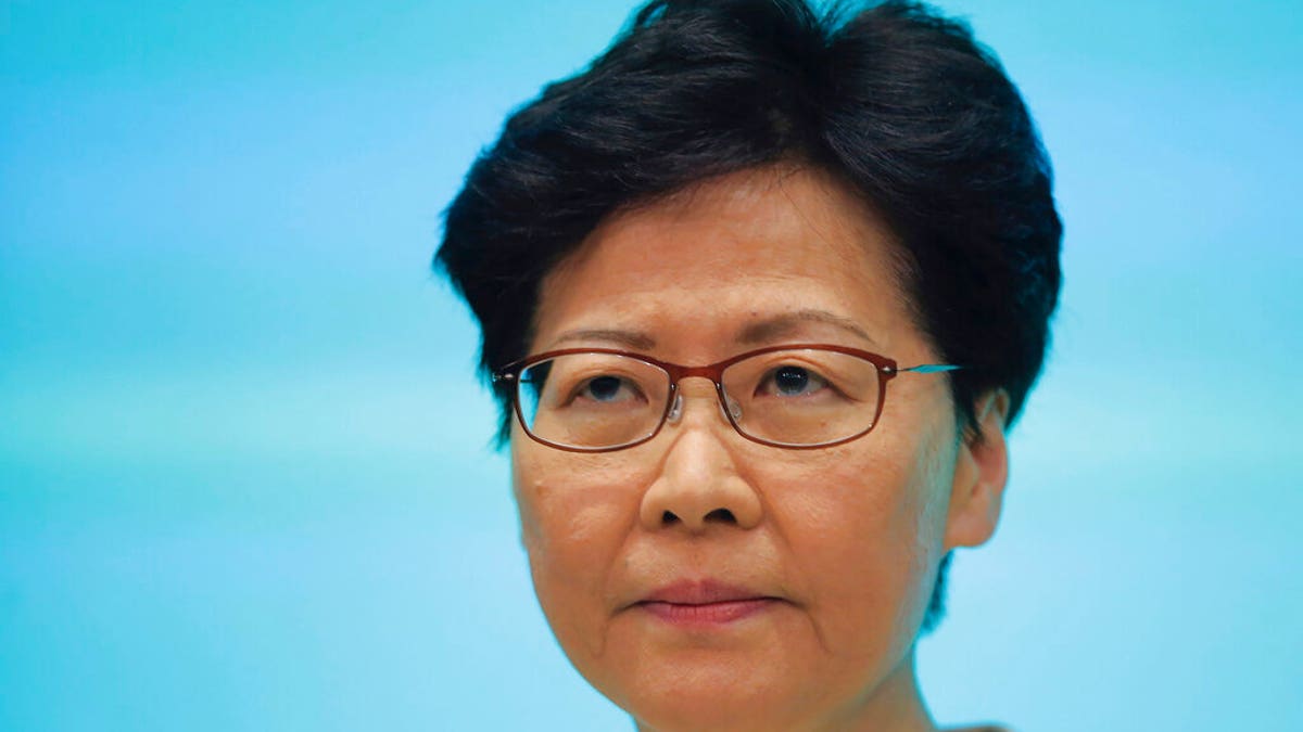 Hong Kong Chief Executive Carrie Lam pauses during a press conference at the Legislative Council in Hong Kong, Tuesday, June 18, 2019. Hong Kong leader apologizes for her handling of unpopular extradition bill, says the city needs hope. (AP Photo/Kin Cheung)