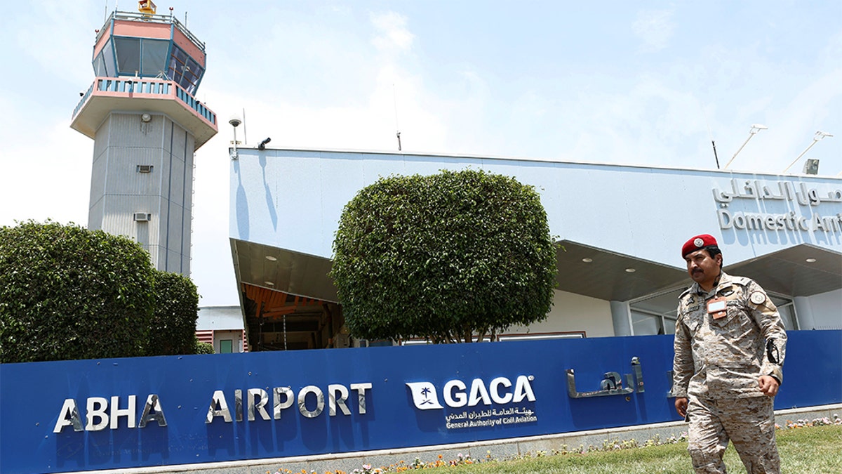 A security officer walking past Saudi Arabia's Abha airport. (REUTERS/Faisal al Nasser)