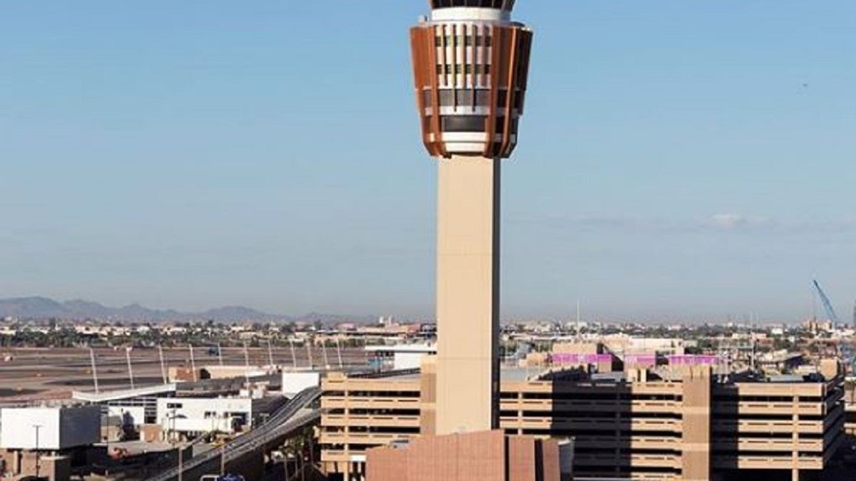 A man was arrested Tuesday after allegedly rushing a security checkpoint at the Phoenix Sky Harbor International Airport and injuring Transportation Security Administration officers.