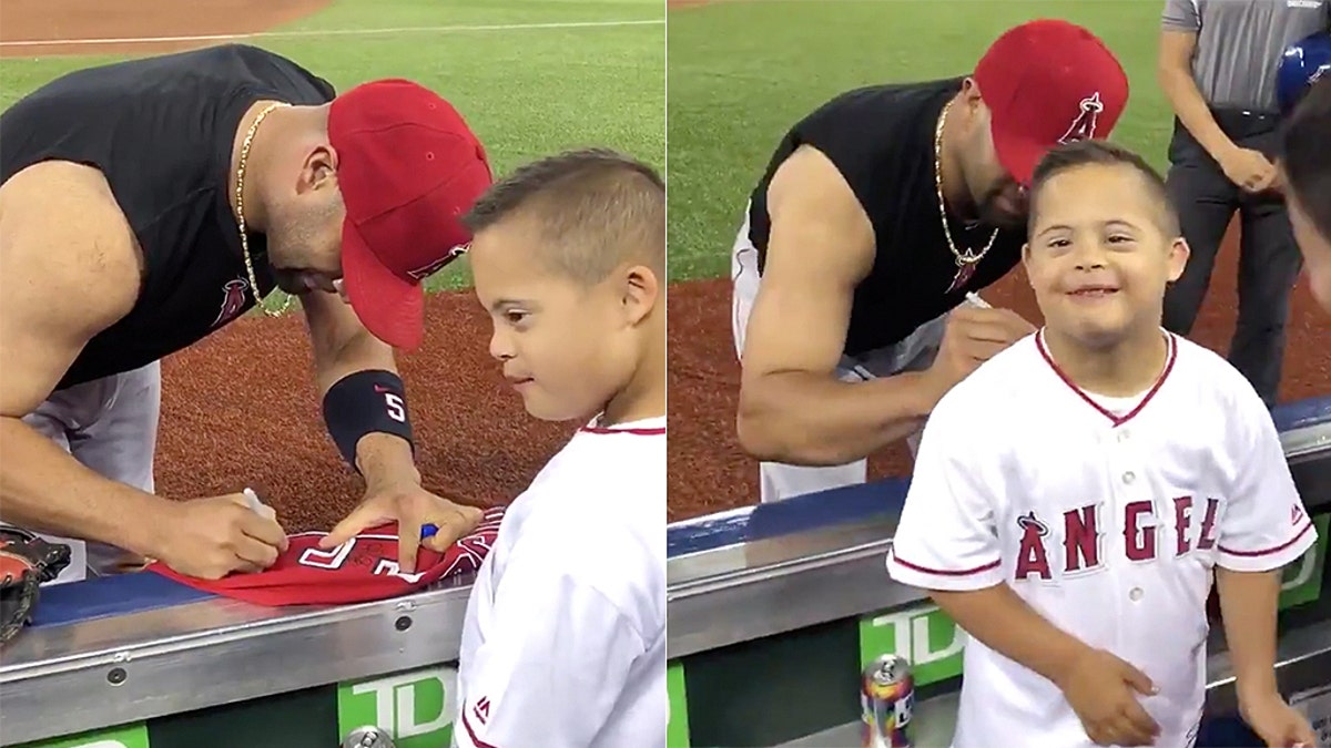 Baseball legend Albert Pujols takes the jersey off his back for young fan  with Down syndrome