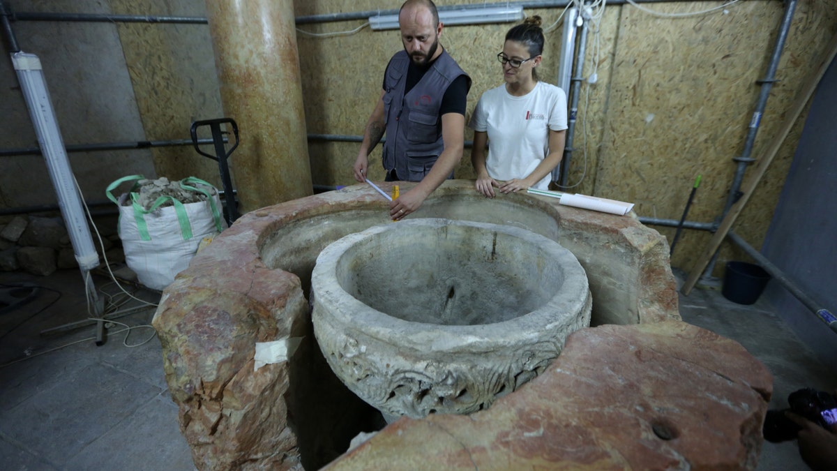 The baptismal font was discovered during restoration work at the Church of the Nativity.