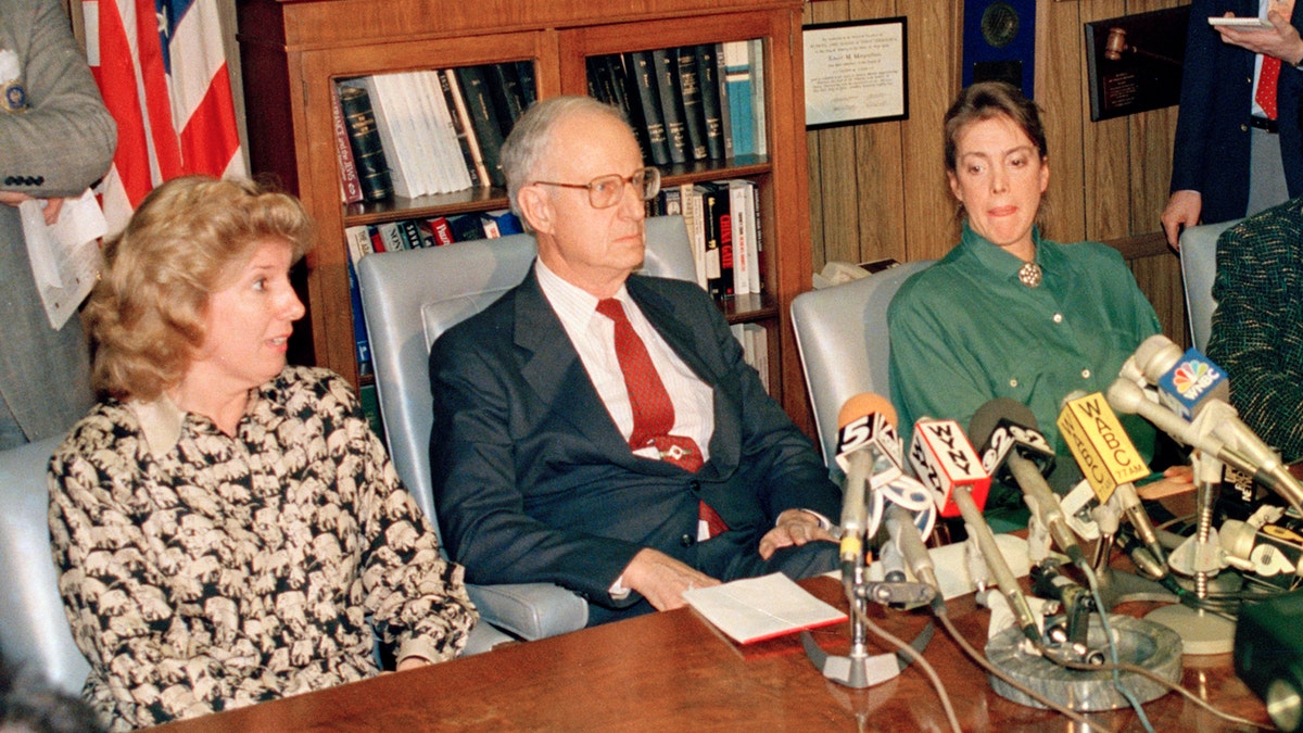 In this March 26, 1988 file photo, prosecutor Linda Fairstein, left, is shown during a news conference in New York. Fairstein was the top Manhattan sex crimes prosecutor when five teenagers were wrongly charged with the 1989 rape and beating of a woman jogging in New York's Central Park. Seated at the table from left are Fairstein, District Attorney Robert Morgenthau, and Ellen Levin, whose daughter Jennifer Levin was murdered in 1986. (AP Photo/Charles Wenzelberg, File)