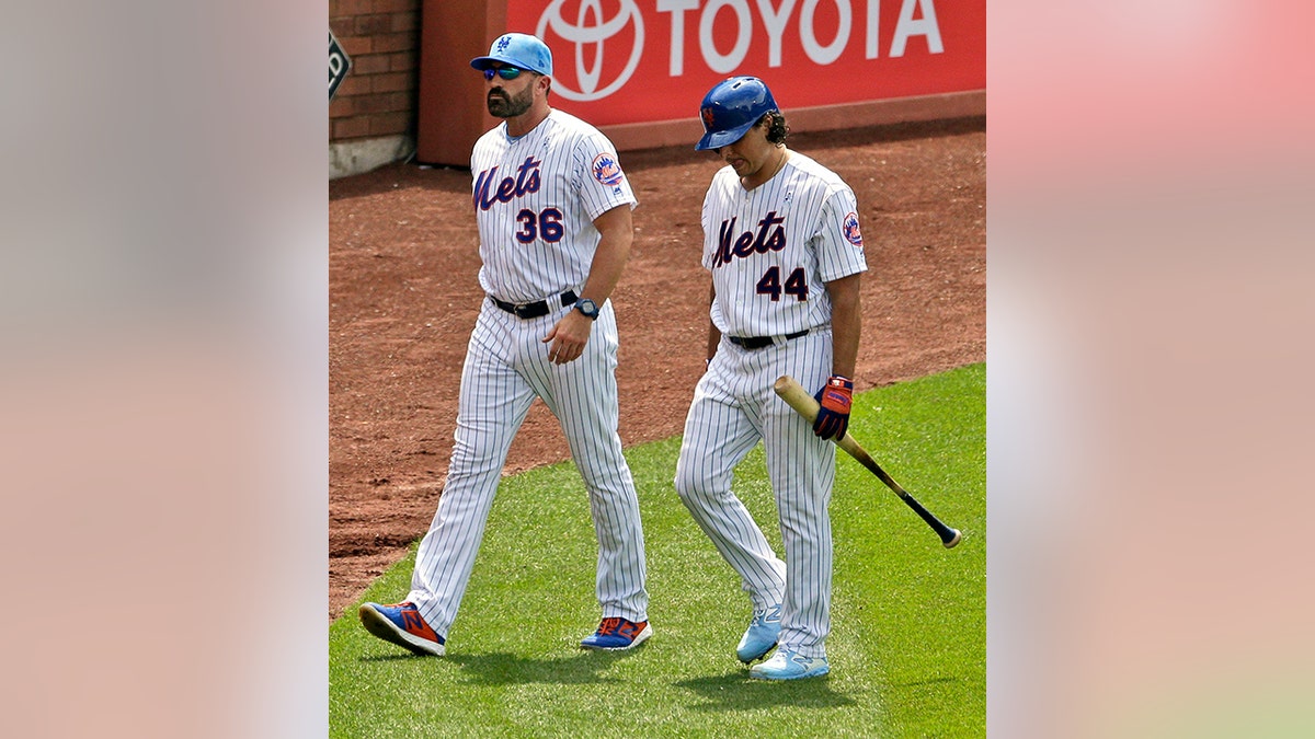 Mets manager Mickey Callaway, left, and pitcher Jason Vargas are pictured last week during a game against the St. Louis Cardinals. (AP Photo/Seth Wenig)