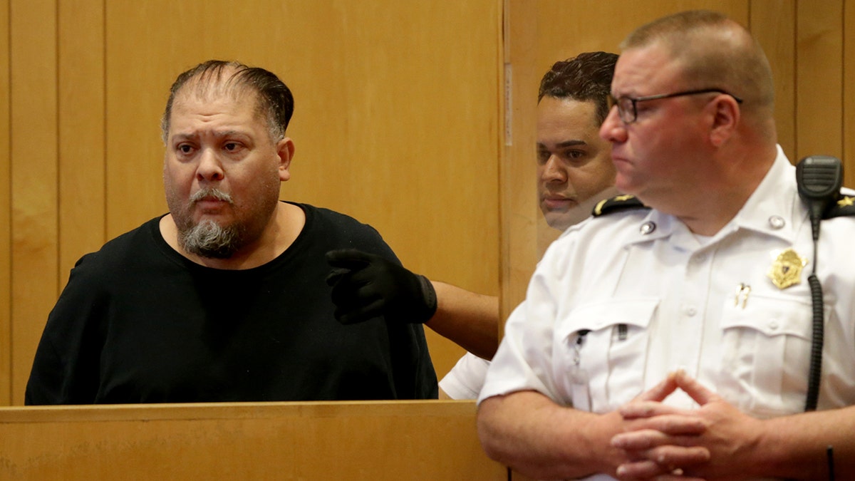 Carlos Rivera, left, appears at his arraignment at Lawrence District Court in Lawrence, MA on May 28, 2019. (Photo by Jonathan Wiggs/The Boston Globe via Getty Images)