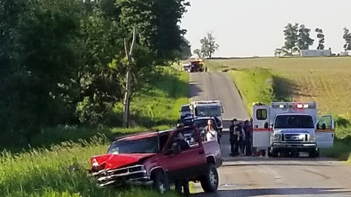 A damaged truck sits on the side of the road after an accident involving a horse-drawn carriage on Friday, June 7, 2019. Michigan State Police said the pickup truck was headed southbound when the driver rear-ended an Amish, horse-drawn carriage. Two adults and five children were ejected from the carriage. 