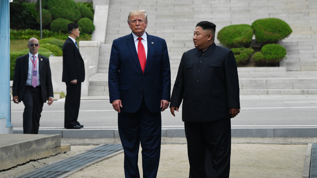 President Donald Trump and North Korean leader Kim Jong Un, stand on the North Korean side of the border in the Demilitarized Zone, Sunday, June 30, 2019 in North Korea. (AP Photo/Susan Walsh)