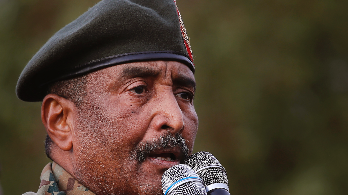 Sudanese Gen. Abdel-Fattah Burhan, head of the military council, speaks during a military-backed rally, in Omdurman district, west of Khartoum, Sudan, Saturday, June 29, 2019. 