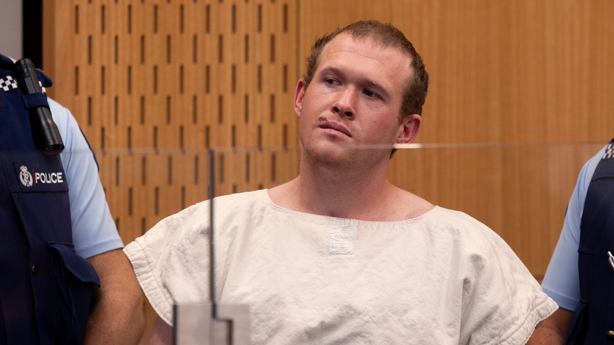 In this Saturday, March 16, 2019 photo, Brenton Tarrant, the man charged in the Christchurch mosque shootings, appears in the Christchurch District Court, in Christchurch, New Zealand. 