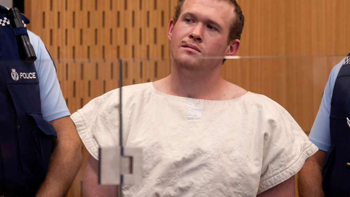 In this Saturday, March 16, 2019 photo, Brenton Tarrant, the man charged in the Christchurch mosque shootings, appears in the Christchurch District Court, in Christchurch, New Zealand.