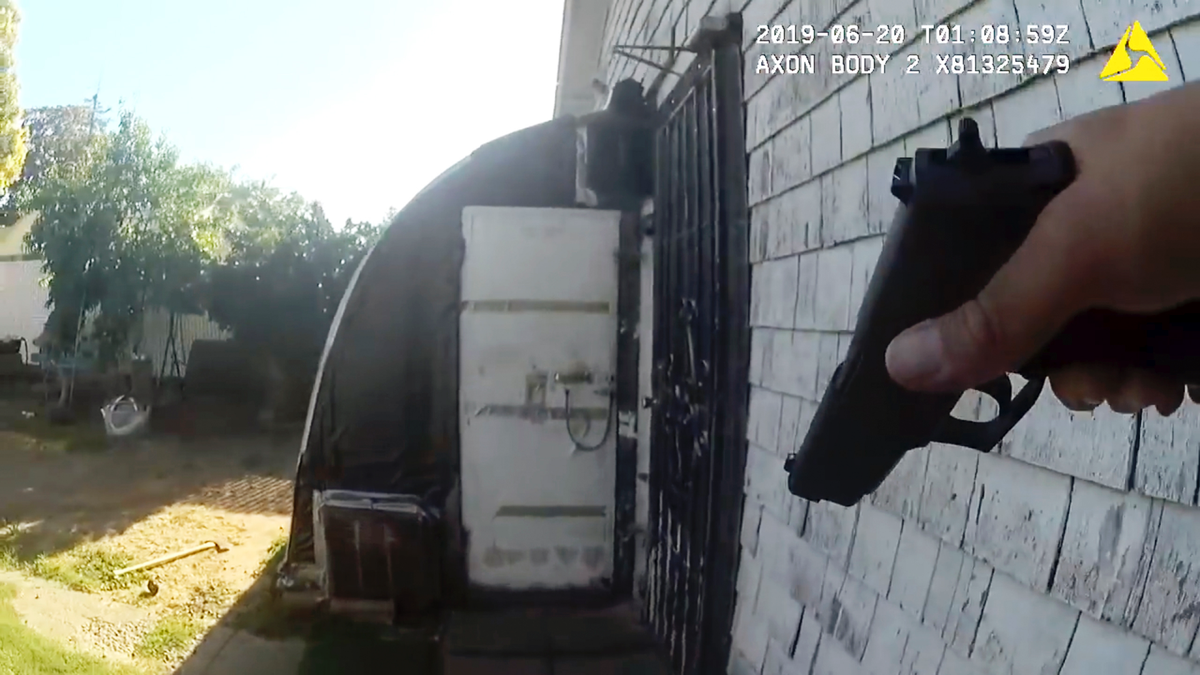 This still image taken from bodycam video released by the Sacramento Police Dept. shows the gunfight in which Sacramento Police Officer Tara O'Sullivan was shot (Sacramento Police Dept. via AP)