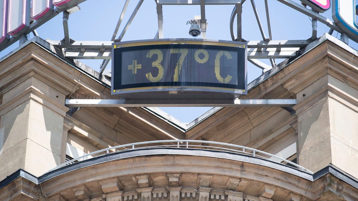 A sign shows 37 degrees Celsius at a building in the city of Stuttgart, Germany, Wednesday, June 26, 2019.