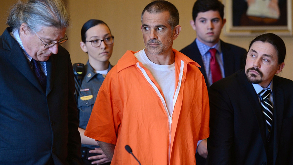 Fotis Dulos and his legal tea during a court hearing Tuesday.