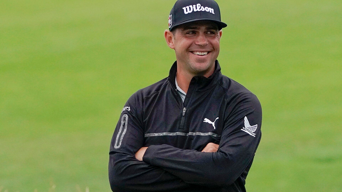 Gary Woodland smiles after finishing the second round in the U.S. Open golf tournament Friday, June 14, 2019, in Pebble Beach, Calif. (AP Photo/Carolyn Kaster)