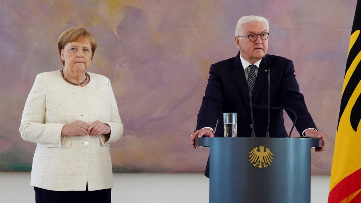 Angela Merkel was seen shaking at a public event for the second time in less than two weeks as she stood alongside President Frank-Walter Steinmeier at a ceremony in Berlin.