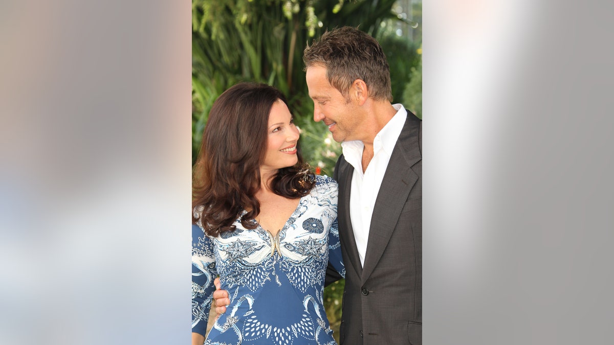 Fran Drescher and Peter Marc Jacobson attend Happily Divorced' photocall as part of MIPCOM 2011 at Hotel Majestic on Oct. 3, 2011, in Cannes, France. (Photo by Tony Barson/Getty Images)