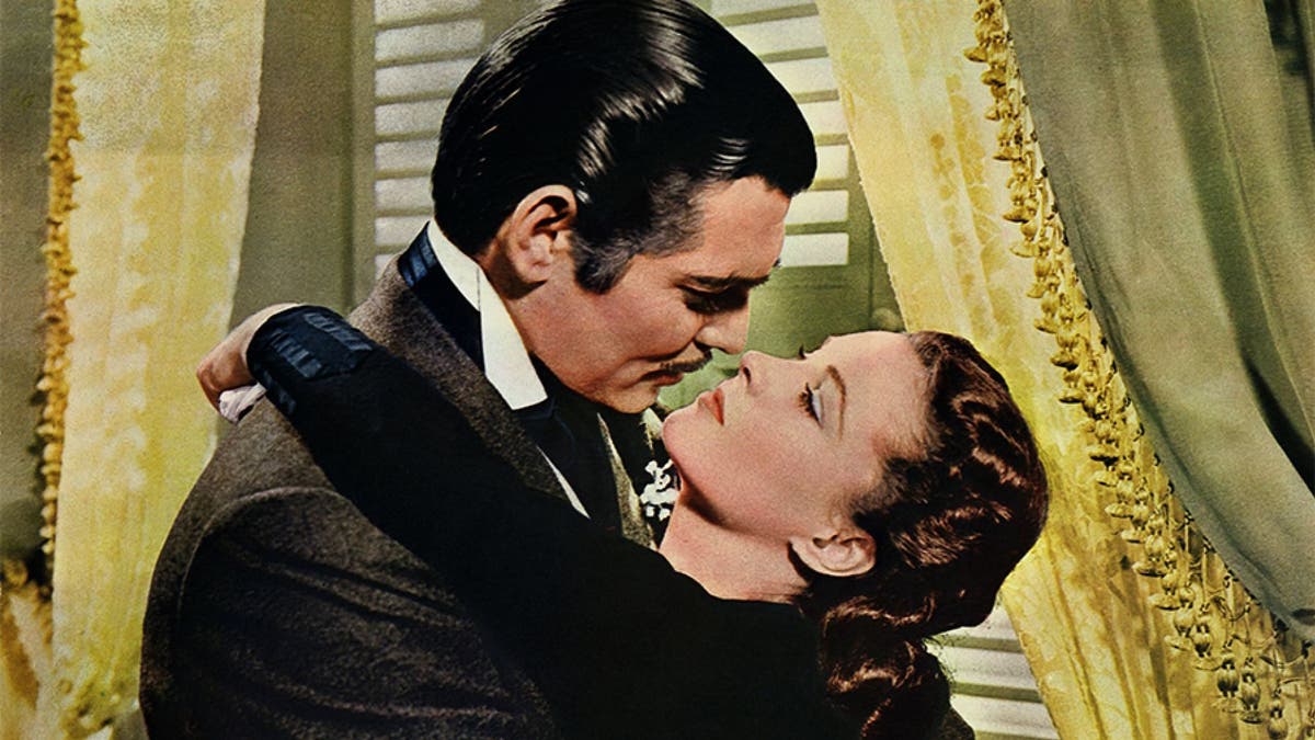 Rhett Butler (Clark Gable) embraces Scarlett O'Hara (Vivien Leigh) in a famous scene from the 1939 epic film "Gone with the Wind."