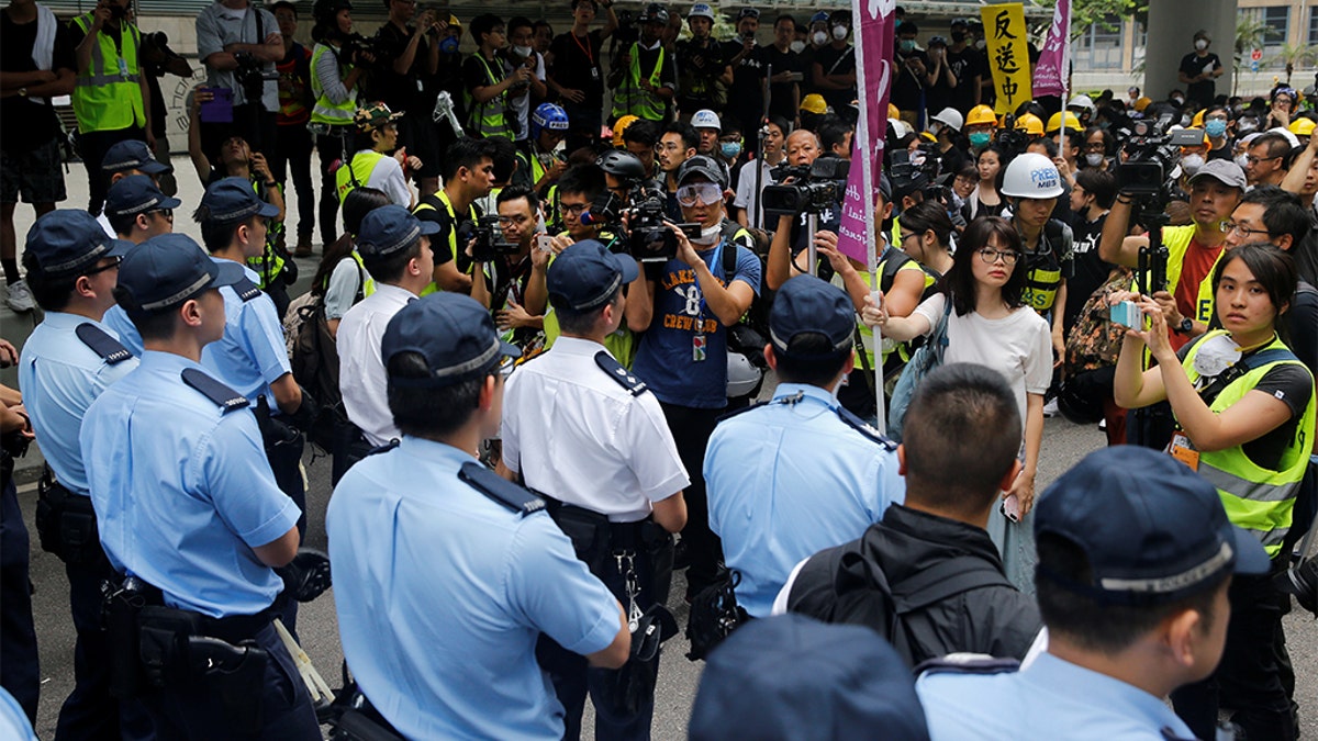 Protesters negotiating with police outside the Legislative Council building in Hong Kong.
