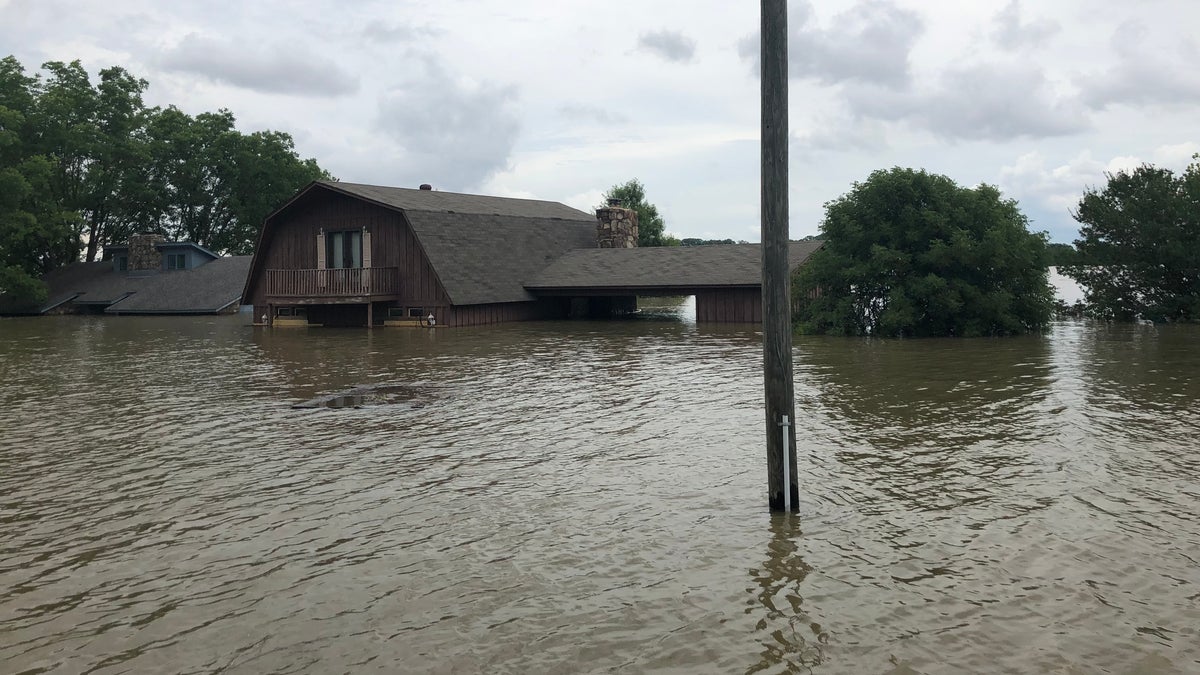 Historic flooding in Arkansas left neighborhoods inundated.