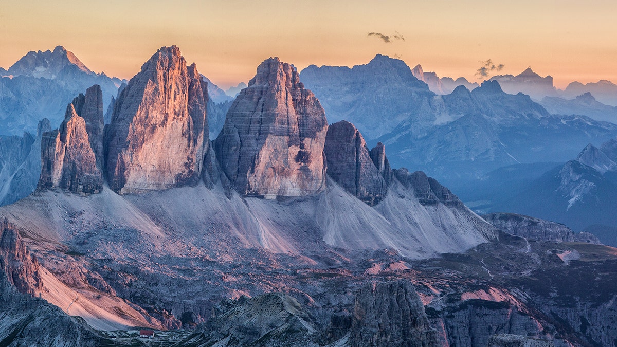 A British base jumper crashed into a rock face and plummeted to his death after leaping from a peak the Italian Dolomites on Saturday.