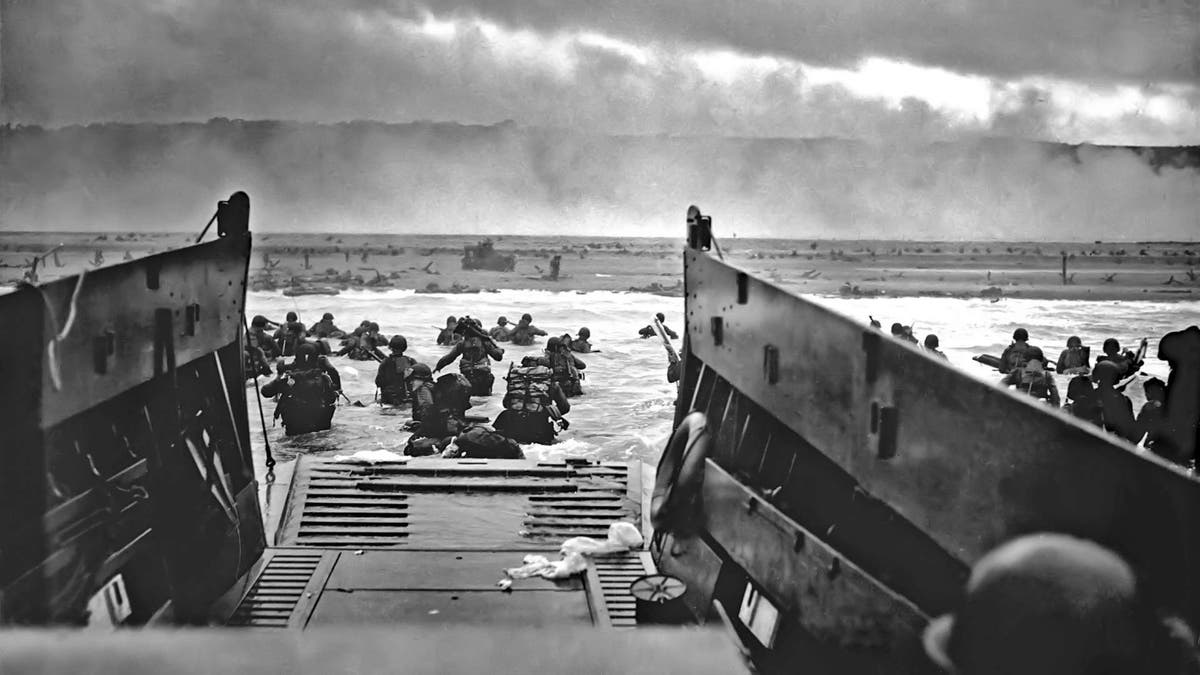 Coast Guard Chief Photographer’s Mate Robert F. Sargent captured this famous D-Day image of the scene on Omaha Beach at about 7:40 a.m. on June 6, 1944.