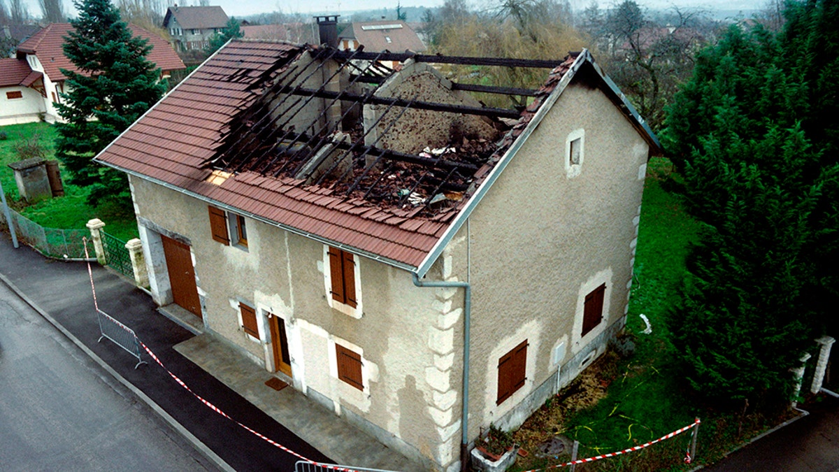 A picture taken on January 12, 1993 shows the burned house of French citizen Jean-Claude Romand in Prévessin-Moëns, where he murdered his wife and two children. - Jean-Claude Romand, sentenced to life in 1996 for the murder of his parents, his wife and children, has filed an application for parole to be examined on September 18, 2018 said judicial source on September 6, 2018. (Photo by Pierre BESSARD / AFP) (Photo credit should read PIERRE BESSARD/AFP/Getty Images)