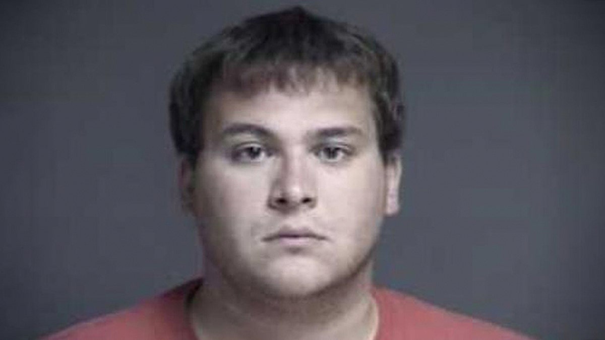 John Austin Hopkins, 25, was indicted after allegedly touching dozens of first-grade female students inappropriately during gym class, officials said.