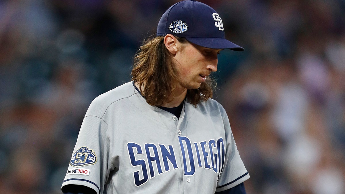 Matt Strahm was ejected from the game against the Colorado Rockies on Saturday. (AP Photo/David Zalubowski)