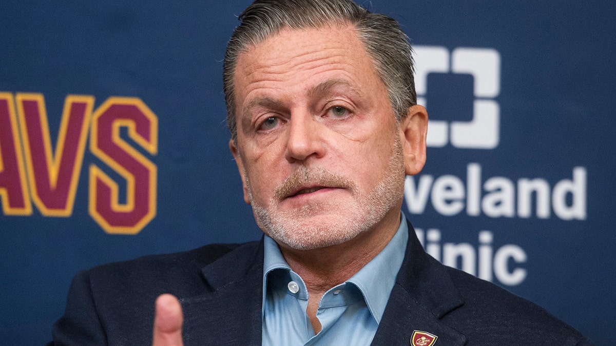 FILE - In this July 26, 2017, file photo, Cleveland Cavaliers owner Dan Gilbert answers a question during a news conference at the Cavaliers training facility in Independence, Ohio. Gilbert has been released from a Detroit-area hospital nearly a month after suffering a stroke. Quicken Loans president CEO Jay Farner says Gilbert was discharged Wednesday, June 19, 2019, from Beaumont Hospital in Royal Oak, Michigan.(AP Photo/Phil Long, File)