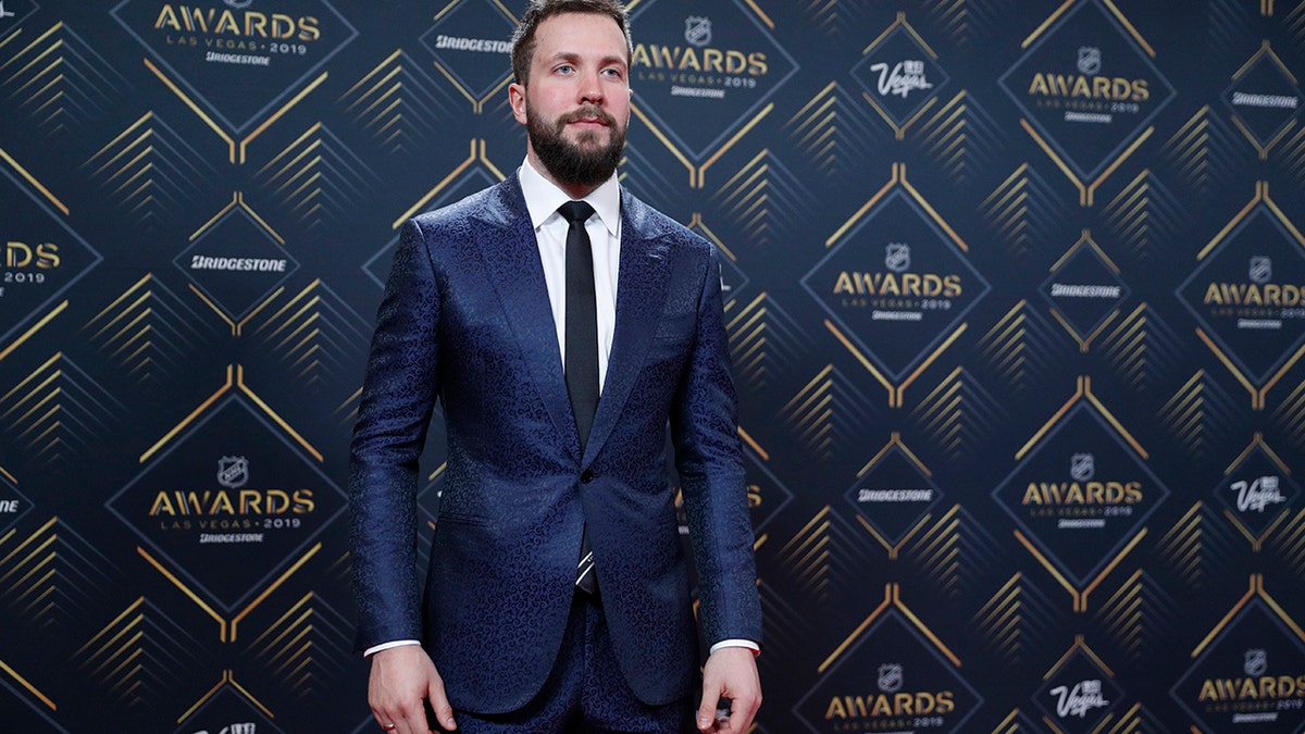 Tampa Bay Lightning's Nikita Kucherov poses on the red carpet before the NHL Awards, Wednesday, June 19, 2019, in Las Vegas. (AP Photo/John Locher)