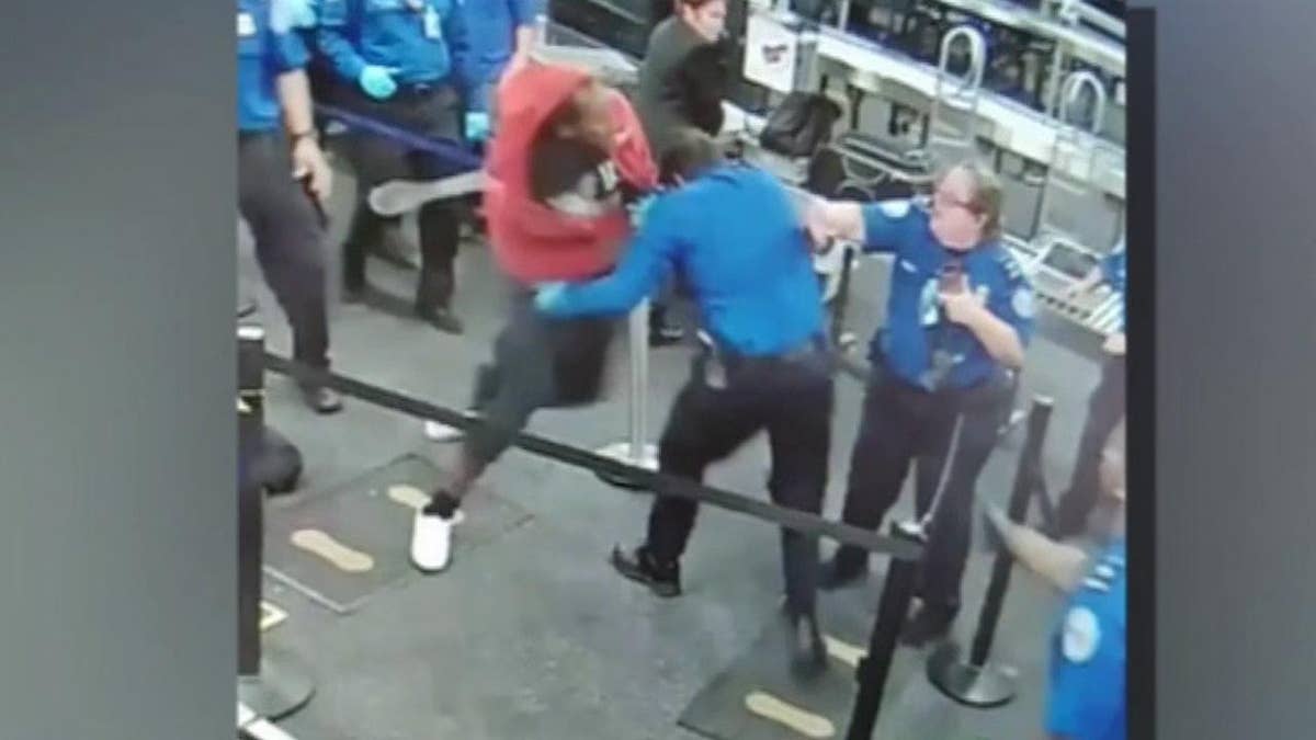 Footage taken at the Phoenix Sky Harbor International Airport shows the man bursting through the checkpoint.